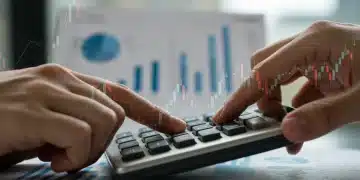 Calculatrice affichant des taux d'intérêt, symbolisant le refinancement hypothécaire et les décisions financières.